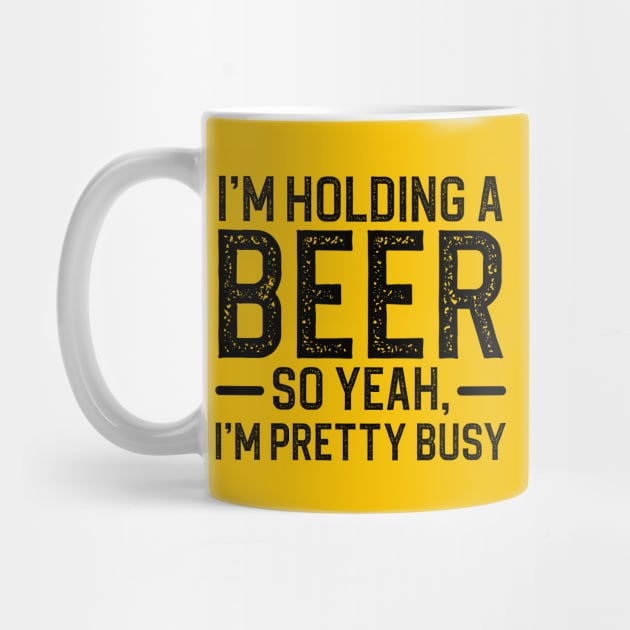 I'm Holding A Beer So Yeah I'm Pretty Busy by DragonTees